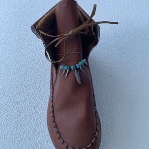 Brown faux leather moccasins